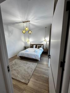 Ένα ή περισσότερα κρεβάτια σε δωμάτιο στο District Deluxe