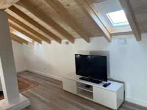 Et tv og/eller underholdning på Alojamento Infantes