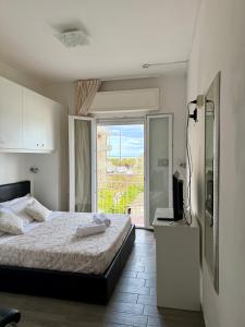 Postel nebo postele na pokoji v ubytování B&B Mima