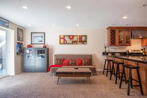 a kitchen and a living room with a couch and a table at Northern Daylights in White Salmon