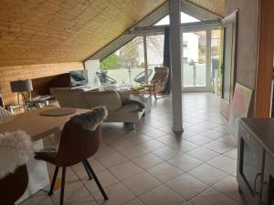 Posezení v ubytování Ferienwohnung Kirschenlohr