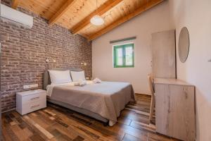 Giường trong phòng chung tại Villa Elia +14 ảnh