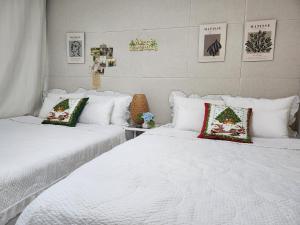 Postel nebo postele na pokoji v ubytování Stay Seoul Stay