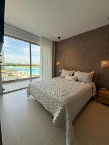 Voodi või voodid majutusasutuse Vista a la laguna - Baia Kristal toas