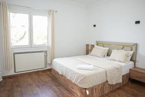 Ένα ή περισσότερα κρεβάτια σε δωμάτιο στο villa Agnes +16 φωτογραφίες