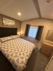 Postel nebo postele na pokoji v ubytování Isle of Wight Caravan