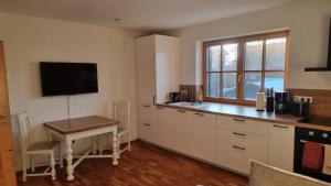 Kuchyň nebo kuchyňský kout v ubytování Ferienglück Allgäu Ferienwohnung Antonia
