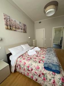 Ένα ή περισσότερα κρεβάτια σε δωμάτιο στο Appartamento Elena