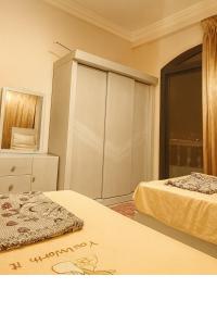 En eller flere senge i et værelse på Cairo Airport Oasis Cozy Convenient