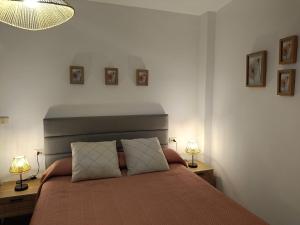 Postel nebo postele na pokoji v ubytování Casa Mugardos