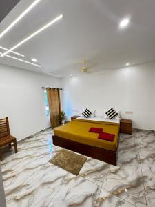 Postel nebo postele na pokoji v ubytování Rolax Tourist home + 18 fotografií