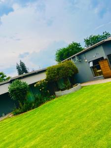 Zahrada ubytování QHAWEKAZI GUEST HOUSe