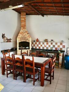 Et opholdsområde på Férias a 5 min da praia | Piscina | Churrasqueira