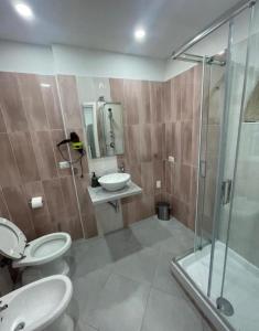 Ένα μπάνιο στο Aurora Flavia Suites