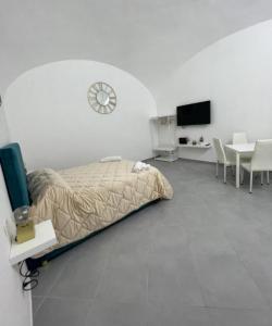 Μια τηλεόραση ή/και κέντρο ψυχαγωγίας στο Aurora Flavia Suites