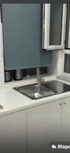 Η κουζίνα ή μικρή κουζίνα στο Aurora Flavia Suites