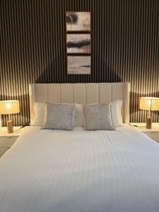 Voodi või voodid majutusasutuse A 2 Bed Luxury Cottage in the heart of 100 Acres toas