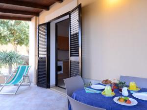 a table with plates of food on top of it at Oasis Hotel Residence Resort in Lampedusa