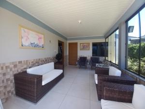 Posezení v ubytování Casa Com Quatro Dormitórios Pertinho Do Mar Em Capão Da Canoa