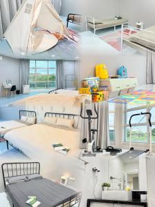 a room with two beds in it at KB Penang Guest House in Kepala Batas