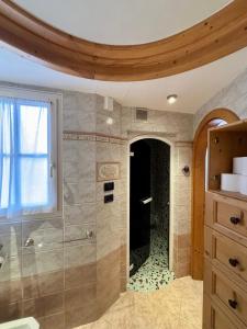 Ένα μπάνιο στο Pragma Apartments - Dolomiti by Valentina +15 φωτογραφίες