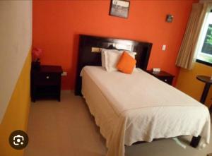 En eller flere senge i et værelse på Del este