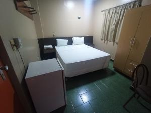 En eller flere senge i et værelse på Del este