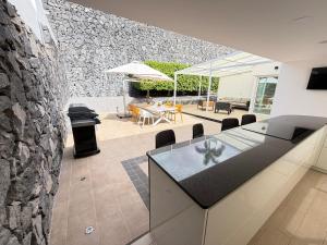 Posezení v ubytování Exklusive Villa mit beheiztem Pool in Costa Adeje + 25 fotografií