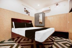 Ένα ή περισσότερα κρεβάτια σε δωμάτιο στο Hotel O Stay Inn Classic Hotel +21 φωτογραφίες