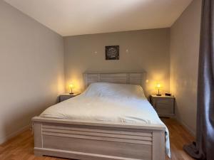 Ένα ή περισσότερα κρεβάτια σε δωμάτιο στο Escapade Coubonnaise