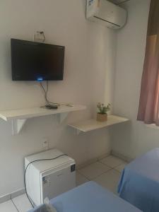 Μια τηλεόραση ή/και κέντρο ψυχαγωγίας στο ALVORADA PALACE HOTEL