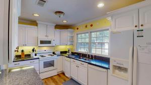 Köök või kööginurk majutusasutuses Lyons Den