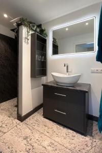 Ένα μπάνιο στο Ferienhaus Hörnchen