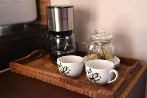 Příslušenství pro přípravu čaje a kávy v ubytování Νηρηίδες + 11 fotografií