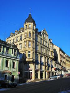 a large building with a cross on the top of it at Altstadt Studio Sankt Annenblick in Annaberg-Buchholz