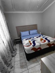 Voodi või voodid majutusasutuse Mama R's Hostel life experience toas