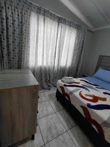 Voodi või voodid majutusasutuse Mama R's Hostel life experience toas