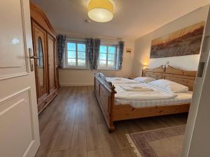 Postel nebo postele na pokoji v ubytování Austernfischer