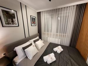 En eller flere senge i et værelse på Apartament Skansen - Sanok