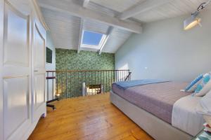 Ένα ή περισσότερα κρεβάτια σε δωμάτιο στο AMORE RENTALS - Palazzo Mary