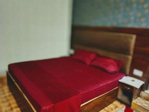 Postel nebo postele na pokoji v ubytování Hotel Madhuban Hills