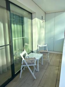 Balkón nebo terasa v ubytování Apartment in Cortina North