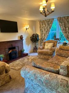 Istumisnurk majutusasutuses King Carson Cottage +52 fotot