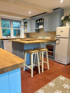 Köök või kööginurk majutusasutuses King Carson Cottage