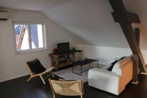 Posezení v ubytování Chez Cécile, appartement 4 personnes Alsace Vignoble