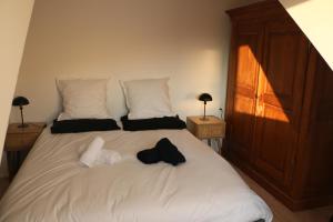 Postel nebo postele na pokoji v ubytování Chez Cécile, appartement 4 personnes Alsace Vignoble