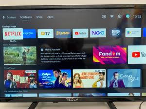 a television screen with a bunch of movies at NERi in Koper