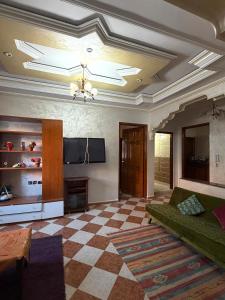 Una televisión o centro de entretenimiento en Samadis Home 8 fotos más