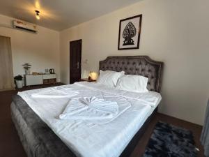 Ένα ή περισσότερα κρεβάτια σε δωμάτιο στο Reaksa Private Villa - Koh Rong