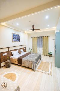 Ένα ή περισσότερα κρεβάτια σε δωμάτιο στο Desai Home Stay